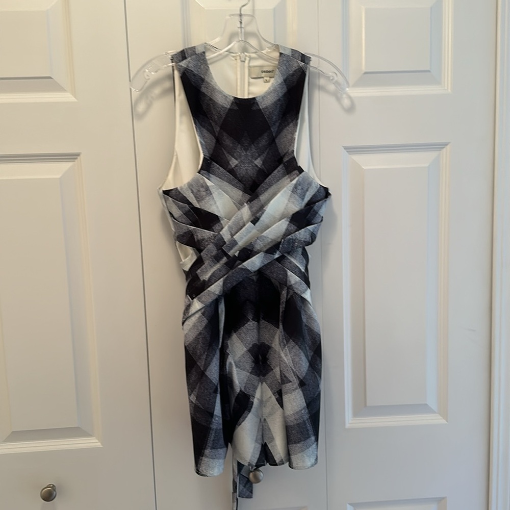 Beautiful jumpsuit (shorts)looks like dress with pockets and tie on the back